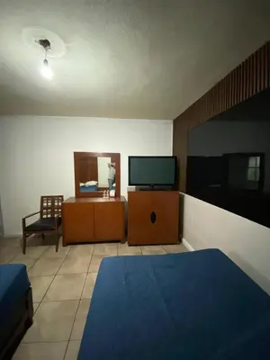 Cama o camas de una habitación en Hotel Puerto México Aeropuerto
