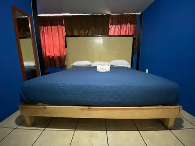 Cama o camas de una habitación en Hotel Puerto México Aeropuerto
