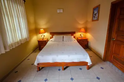Cama o camas de una habitación en Villa San Francisco Hotel