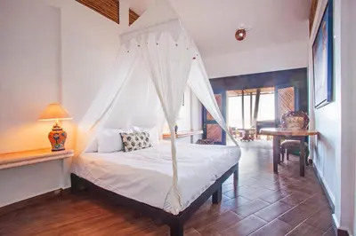 Cama o camas de una habitación en Posada Buda-Tortuga