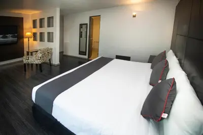 Cama o camas de una habitación en Hotel Las Iglesias, Cholula