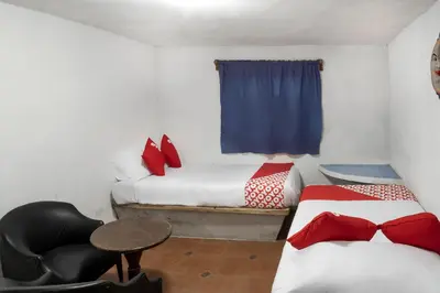 Cama o camas de una habitación en OYO Posada Astrud,Cuetzalan