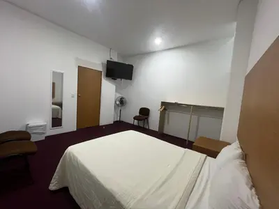Cama o camas de una habitación en Puebla Inn Express