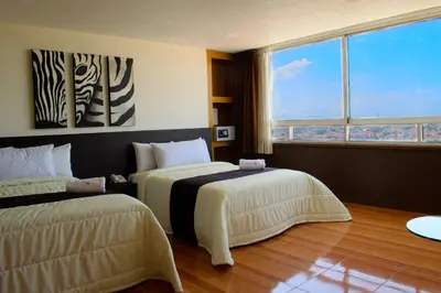 Cama o camas de una habitación en Puebla Inn Express