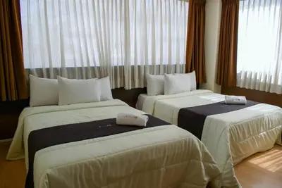 Cama o camas de una habitación en Puebla Inn Express