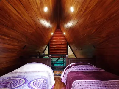 Cama o camas de una habitación en Cabañas El Rincón de Pancho