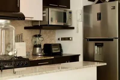Una cocina o zona de cocina en Mi Zona Lodging Xochicalco