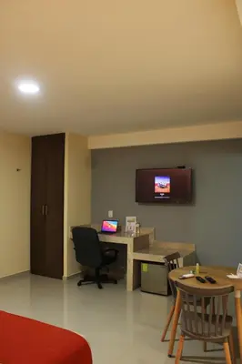 Una televisión o centro de entretenimiento en EXECUTIROOMS VERACRUZ
