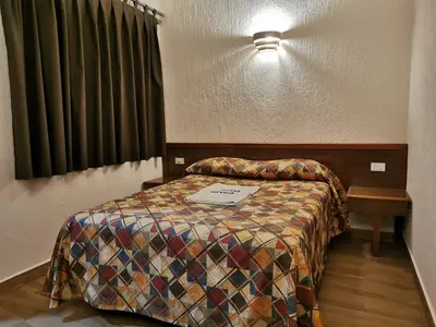 Cama o camas de una habitación en Hotel Mexico