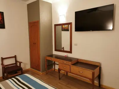 Una televisión o centro de entretenimiento en Hotel Mexico