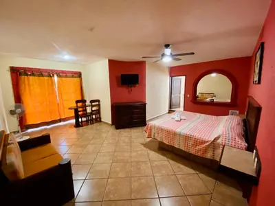 Cama o camas de una habitación en Hotel Cabañas Santa Cruz