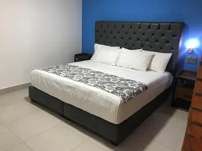 Cama o camas de una habitación en Hotel Jar8 Acuario enfrente al Acuario de Veracruz