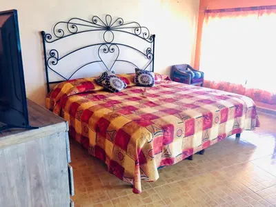 Cama o camas de una habitación en Cabañas el Pajar