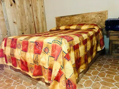 Cama o camas de una habitación en Cabañas el Pajar