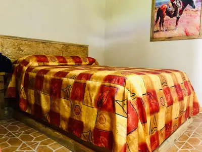 Cama o camas de una habitación en Cabañas el Pajar