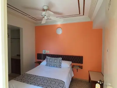 Cama o camas de una habitación en Hotel Atlantico a 150 mts de Playa Martí