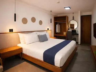 Cama o camas de una habitación en Hotel Ix By San Clemente