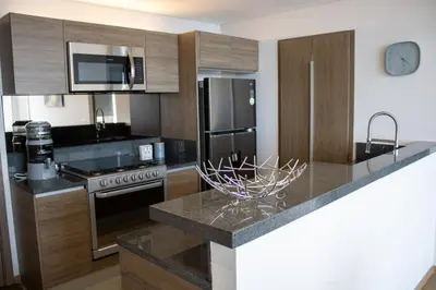 Una cocina o zona de cocina en Condo con Alberca a un Paso del Estadio Azteca