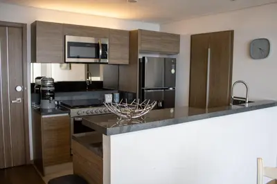 Una cocina o zona de cocina en Condo con Alberca a un Paso del Estadio Azteca