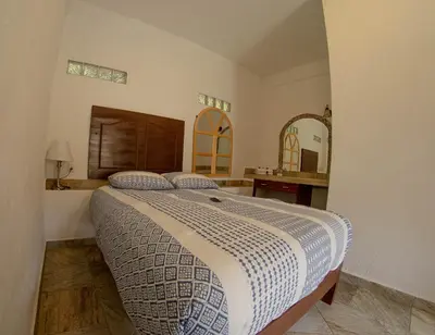 Cama o camas de una habitación en La Buena Suerte
