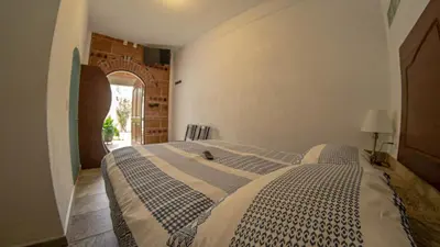 Cama o camas de una habitación en La Buena Suerte