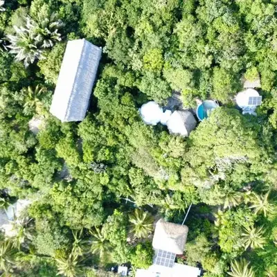 New Ruins Off-The-Grid SuperAdobe Domes with Pool