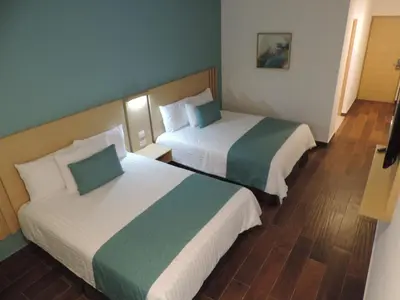 Cama o camas de una habitación en Hotel Plaza Sol Veracruz