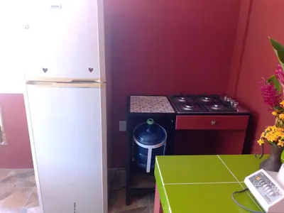 Una cocina o zona de cocina en Departamento full equipped