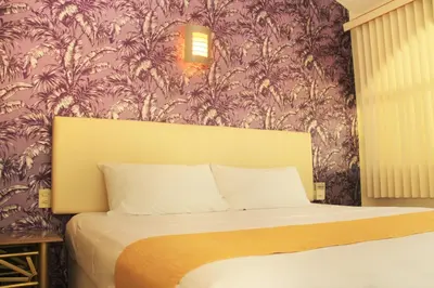 Cama o camas de una habitación en Hotel Gran Palmeiras