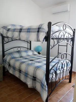 Cama o camas de una habitación en Camino al Mar