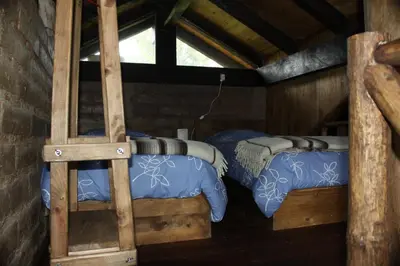 Cama o camas de una habitación en Cabañas La Tierra Grande