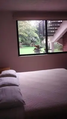 Cama o camas de una habitación en Hotel Quinta del Sol