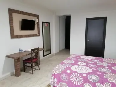 Cama o camas de una habitación en Hotel Las Vias