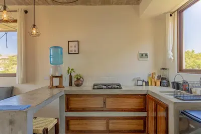 Una cocina o zona de cocina en Casa Mauna Boutique Hotel