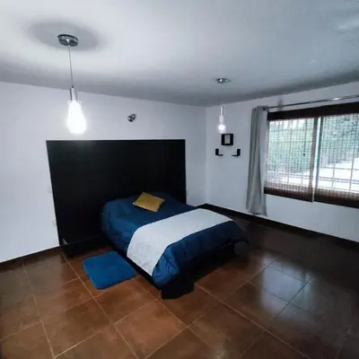 Cama o camas de una habitación en Finca el Nogal - Casa Entera Familiar Moderna con Amplio Jardín Atlixco puebla