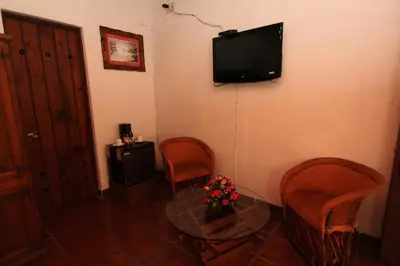 Una televisión o centro de entretenimiento en Parador Monte Carmelo