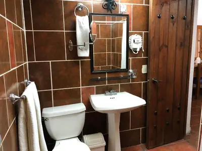 Un baño de Parador Monte Carmelo