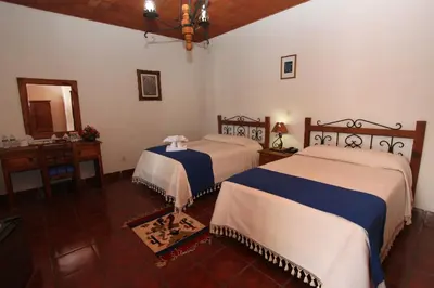 Cama o camas de una habitación en Parador Monte Carmelo