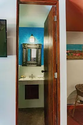 Una televisión o centro de entretenimiento en Hotel Casa Pereyra