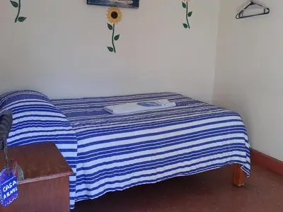 Cama o camas de una habitación en Hotel Casa Arnel