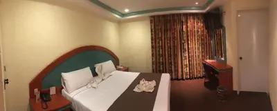 Cama o camas de una habitación en HOTEL ORION