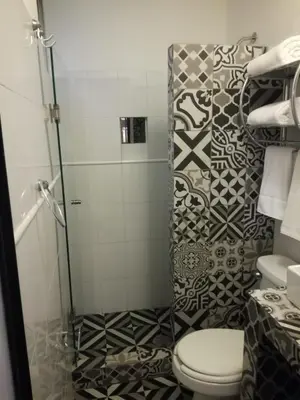 Un baño de Suites Viveros Coyoacán I Hospedaje a tu medida