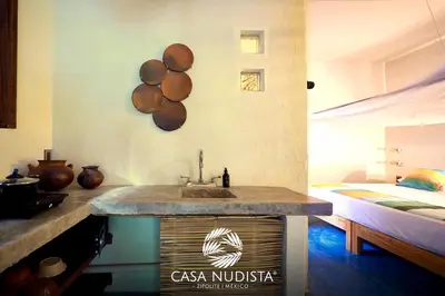 Cama o camas de una habitación en Casa Nudista - LGBT Hotel