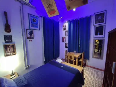 Cama o camas de una habitación en Chuchumbé Hotel & Hostal