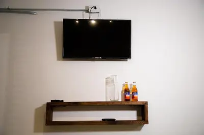 Una televisión o centro de entretenimiento en Casa Iztac
