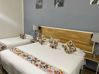 Cama o camas de una habitación en BKL Hotel Oaxaca
