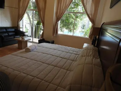 Cama o camas de una habitación en Santuario Jardín de la Abundancia