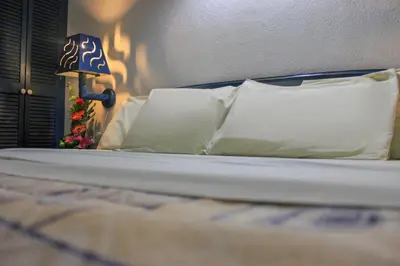 Cama o camas de una habitación en Coral Clubes Acapulco
