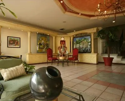 Zona de estar de Hotel Calenda