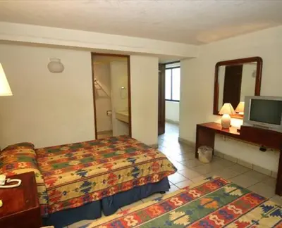 Cama o camas de una habitación en Hotel Calenda